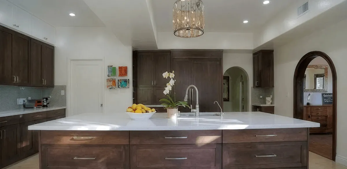Cabinet refacing project with updated kitchen cabinets and island in Mobile, AL